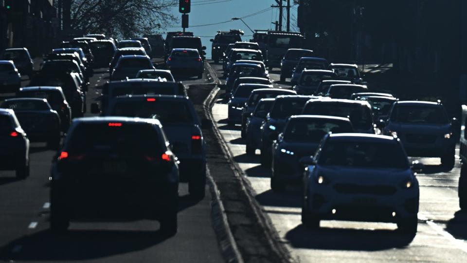 Cars on a busy road.