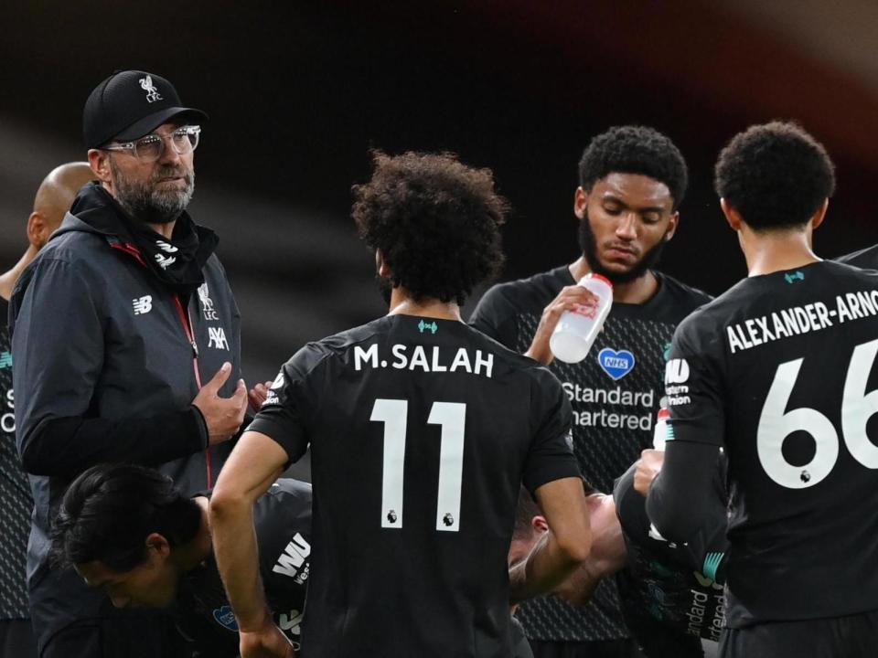 Liverpool manager Jurgen Klopp with his players: Reuters