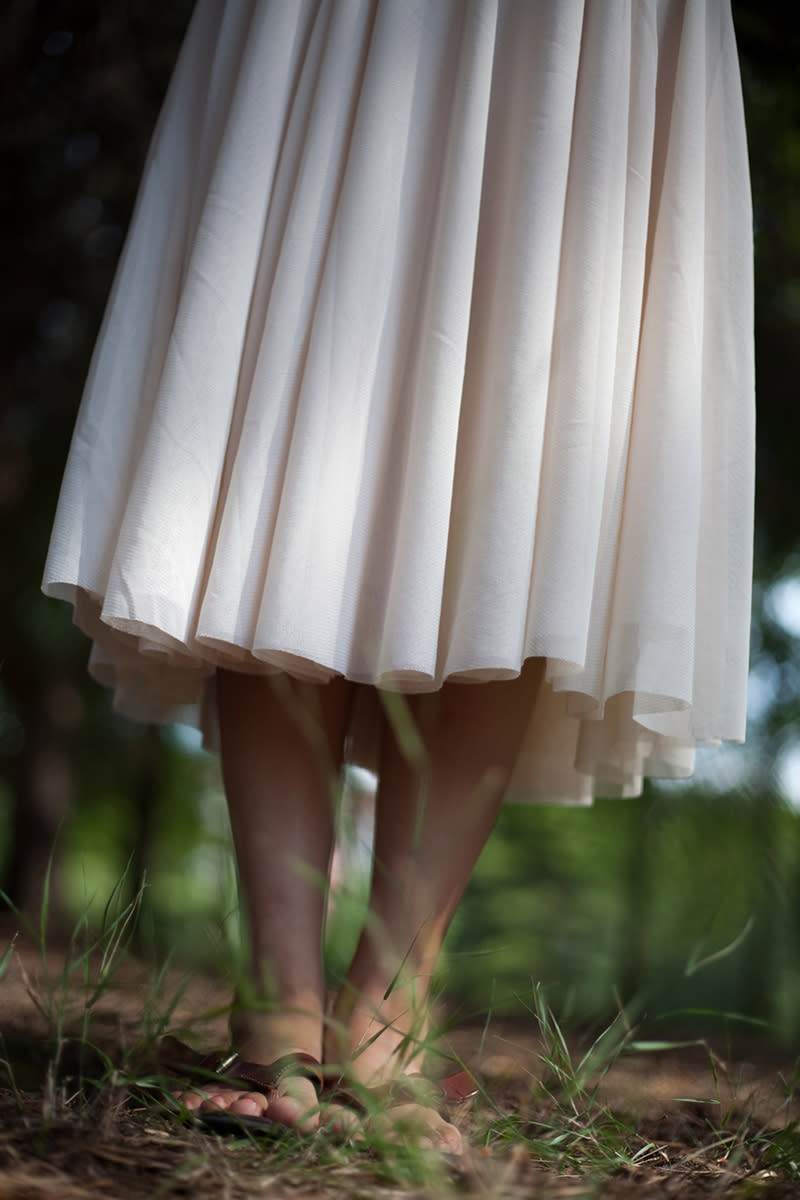 <div class="caption-credit"> Photo by: Thinkstock</div><b>Your Skirt Length Is Moving Down, Down, Down</b> <br> Just because your age is increasing doesn't mean your hemline has to as well. A skirt that grazes close to your ankles may hide slightly saggy knees, but it also tends to make women look wider and frumpier. Rothman says to find the most flattering skirt length for your shape, look in the mirror and note the slimmest part of the area around your knee--right above, right below or in the middle--and that's where your hemline should hit. If you want more coverage, try a form-fitting midiskirt, which comes to the middle of your calf. This is a tricky length, so use our <a rel="nofollow noopener" href="http://www.oprah.com/style/Flattering-Midiskirts-How-to-Wear-Longer-Skirts/1?SiteID=ys_20130702_midiskirts_that_flatter_every_shape" target="_blank" data-ylk="slk:guide to finding the right midi hemline for your height;elm:context_link;itc:0" class="link ">guide to finding the right midi hemline for your height</a>. <br>