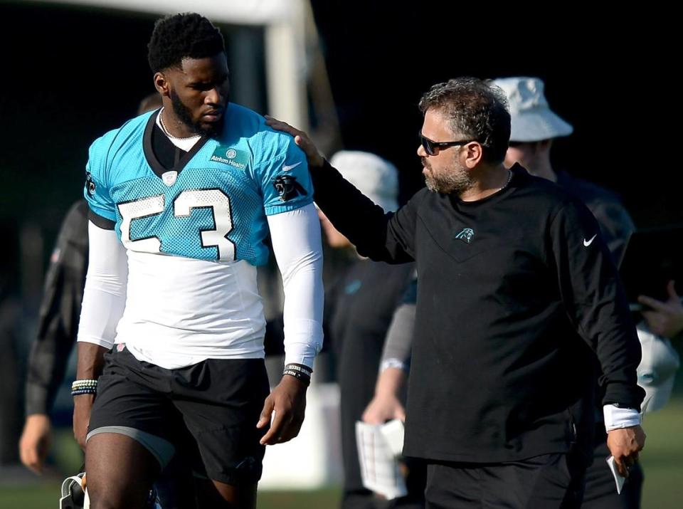 Carolina Panthers defensive end Brian Burns, left and head coach Matt Rhule, right, talk prior to practice at Wofford College in Spartanburg, SC on Wednesday, July 28, 2021.