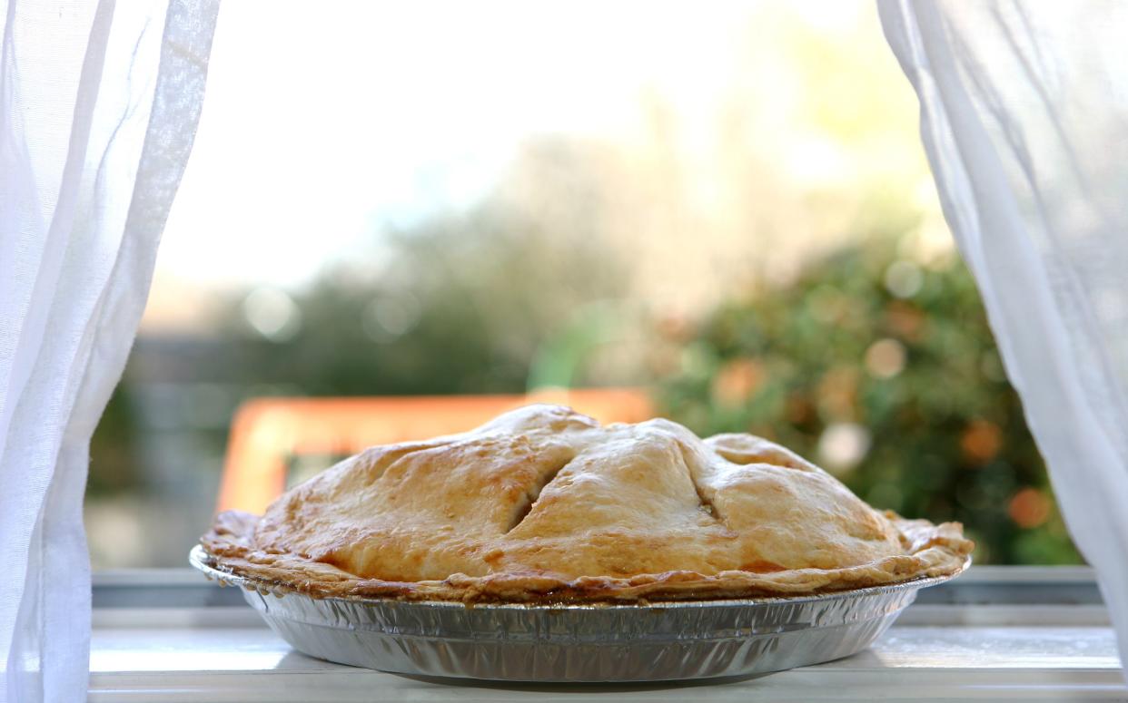 hot apple pie cooling on a window ledge