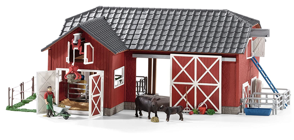 red toy barn with animals and farmers Farm World 27-Piece Play set (Photo via Amazon)