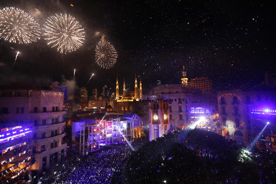 <p>Fireworks explode over the downtown Beirut, Lebanon, during New Year’s celebrations, Monday, Jan. 1, 2018. (Photo: Hussein Malla/AP) </p>