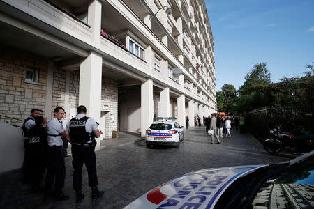 Armed police secure the scene where French soliders were hit and injured by a vehicle in the western Paris suburb of Levallois-Perret, France, August 9, 2017. REUTERS/Benoit Tessier