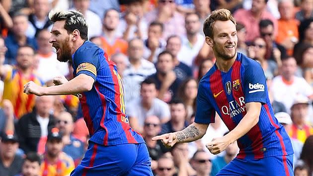 Lionel Messi and Ivan Rakitic. Pic: Getty