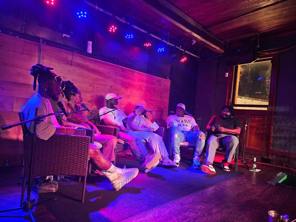 The hosts of The Conveaux Club interview Houma Police Department Narcotics Officer Roy Williams, April 25, at The Balcony in Downtown Houma.