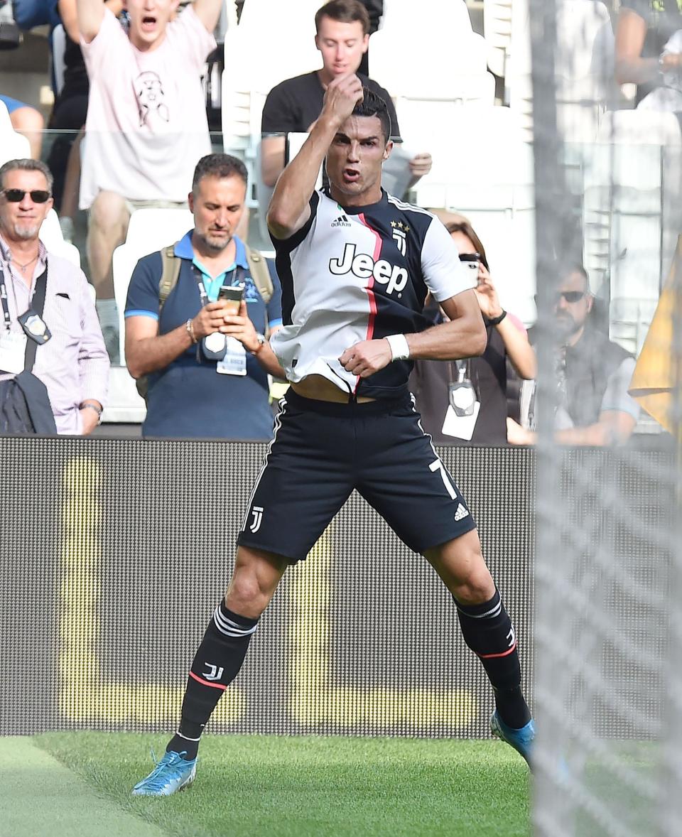 Juventus' Cristiano Ronaldo celebrates after scoring during the Serie A soccer match between Juventus and Spal, at the Allianz Stadium in Turin, Italy, Saturday, Sept. 28, 2019. (Alessandro Di Marco/ANSA via AP)