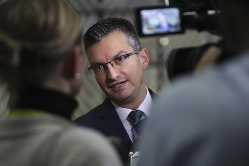 Slovenian Prime Minister Marjan Sarec arrives for an EU summit in Brussels, Friday, Dec. 13, 2019. European Union leaders are gathering Friday to discuss Britain's departure from the bloc amid some relief that Prime Minister Boris Johnson has secured an election majority that should allow him to push the Brexit deal through parliament. (AP Photo/Francisco Seco)