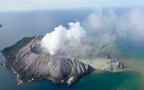 This aerial photo shows White Island after its volcanic eruption in New Zealand Monday, Dec. 9, 2019 - Credit: George Novak/New Zealand Herald