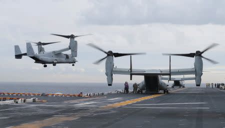 U.S. Marine MV-22B Osprey aircraft land on the deck of the USS Bonhomme Richard amphibious assault ship during events marking the start of Talisman Saber 2017, a biennial joint military exercise between the United States and Australia, off the coast of Sydney, Australia, June 29, 2017. REUTERS/Jason Reed