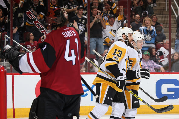 GLENDALE, AZ - FEBRUARY 11: Josh Archibald #45 (R) of the Pittsburgh Penguins is congratulated by Nick Bonino #13 after scoring a shorthanded goal past goaltender Mike Smith #41 of the Arizona Coyotes during the third period of the NHL game at Gila River Arena on February 11, 2017 in Glendale, Arizona. The Coyotes defeated the Penguins 4-3 in overtime. (Photo by Christian Petersen/Getty Images)