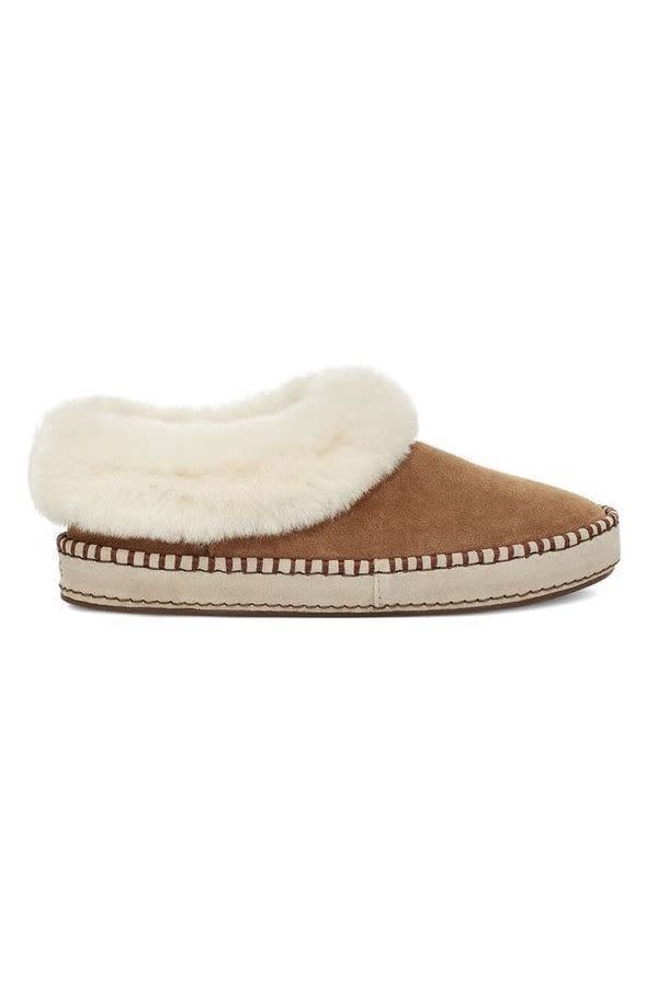 <p><strong>UGG</strong></p><p>amazon.com</p><p><strong>$99.95</strong></p><p><a href="https://www.amazon.com/dp/B083RTKYVS?tag=syn-yahoo-20&ascsubtag=%5Bartid%7C10063.g.34824549%5Bsrc%7Cyahoo-us" rel="nofollow noopener" target="_blank" data-ylk="slk:Shop Now;elm:context_link;itc:0;sec:content-canvas" class="link ">Shop Now</a></p><p>Gift a woman in your who rarely treats herself to a pair of Ugg slippers that will <a href="https://www.elle.com/fashion/shopping/a30170284/ugg-best-slippers-review/" rel="nofollow noopener" target="_blank" data-ylk="slk:change her life;elm:context_link;itc:0;sec:content-canvas" class="link ">change her life</a>. (Or at the very least, keep her toes warm for all winter long.)</p>