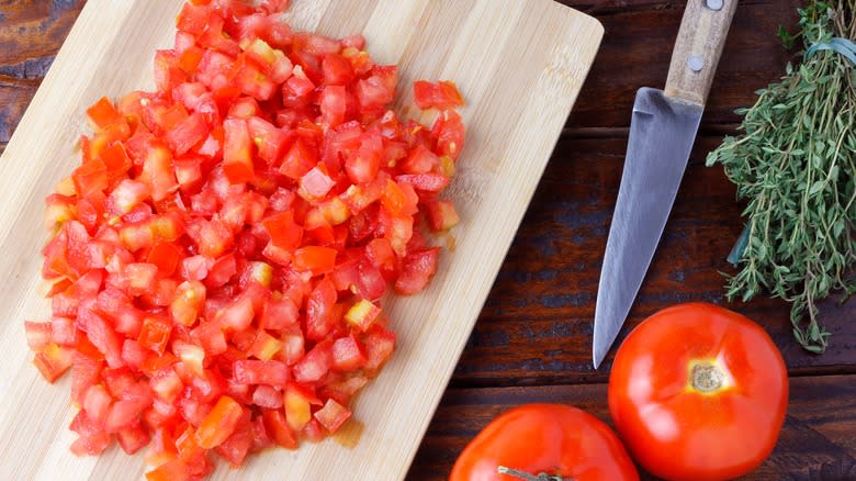 Diced tomatoes on cutting board