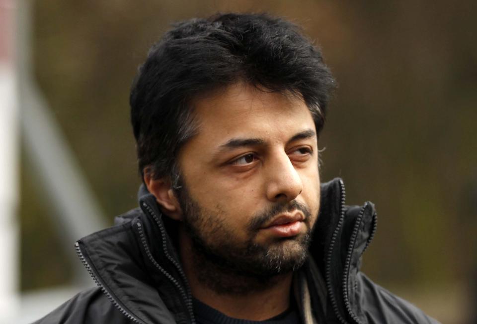 FILE - In this Thursday, Feb. 24, 2011 file photo, Shrien Dewani, the British man accused of having his wife murdered during their honeymoon in South Africa, arrives at Belmarsh Magistrates' Court in London. Shrien Dewani has spent years fighting extradition over the death of his 28-year-old bride Anni. She was found shot dead in an abandoned taxi in Cape Town's Gugulethu township in November 2010. Lawyers for the 34-year-old businessman say he suffers from post-traumatic stress and depression and is unfit to stand trial. But last month Britain’s High Court rejected his grounds for appeal. He is expected to be put on a flight to Cape Town Monday, and South African officials say he will appear in court there Tuesday. The dead woman’s brother, Anish Hindocha, said the extradition brought them “one step closer” to justice. (AP Photo/Matt Dunham, File)