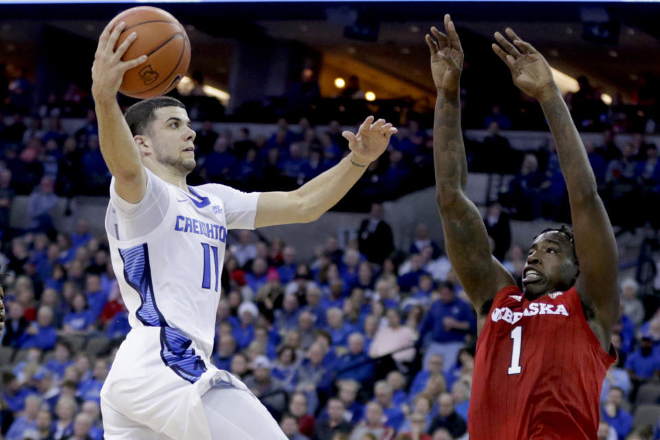 Creighton's Marcus Zegarowski (11) goes to the basket against Nebraska's Kevin Cross (1) during the first half of an NCAA college basketball game in Omaha, Neb., Saturday, Dec. 7, 2019. (AP Photo/Nati Harnik)