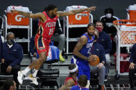 New Orleans Pelicans guard Sindarius Thornwell (15) defends against Los Angeles Clippers guard Paul George (13) during the third quarter of an NBA basketball game Wednesday, Jan. 13, 2021, in Los Angeles. (AP Photo/Ashley Landis)