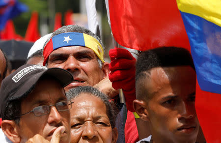 Supporters of Venezuela's President Nicolas Maduro attend his closing campaign rally in Caracas, Venezuela, May 17, 2018. REUTERS/Carlos Jasso