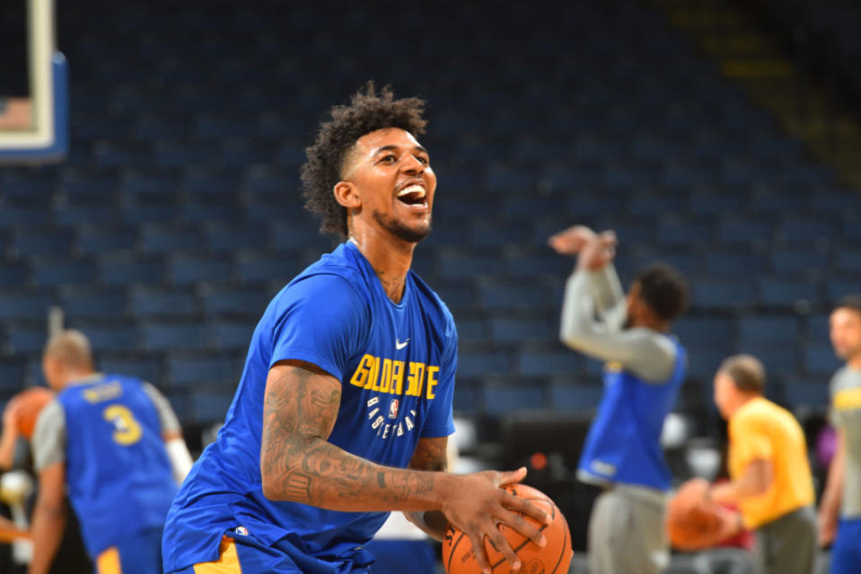 Golden State Warriors guard Nick Young got a new neck tattoo in Cleveland less than 24 hours before Game 3 of the NBA Finals on Wednesday night. (Getty Images)