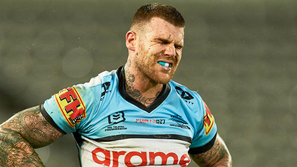 Seen here, Josh Dugan looks on in anguish during an NRL game for the Sharks.