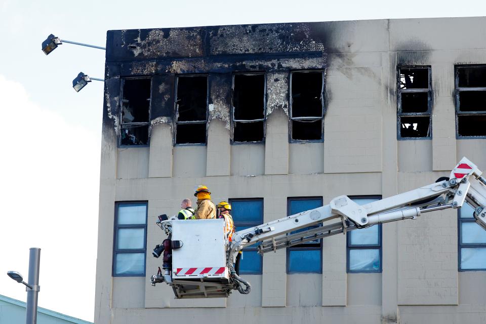 Burnt windows can be seen on the second floor of the lodge (Getty Images)