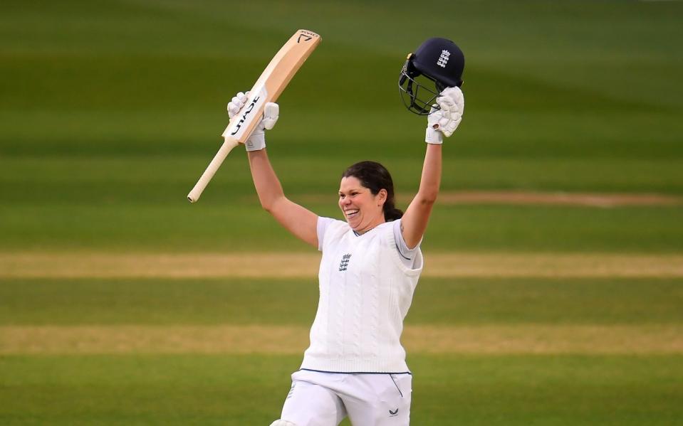 Alice Davidson-Richards of England celebrates their century during Day Two of the First Test Match between England Women and South Africa Women at The Cooper Associates County Ground on June 28, 2022 in Taunton, England. - GETTY IMAGES