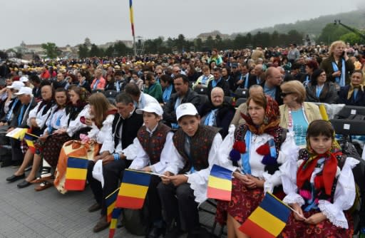 Romanian faithful in traditional dress turned out in their thousands to attend the pontiff's service in Blaj, notably home to thousands of Roma, a long marginalised community