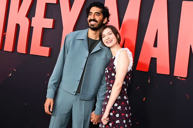 <p>Jon Kopaloff/FilmMagic</p> Dev Patel and Tilda Cobham-Hervey hold hands