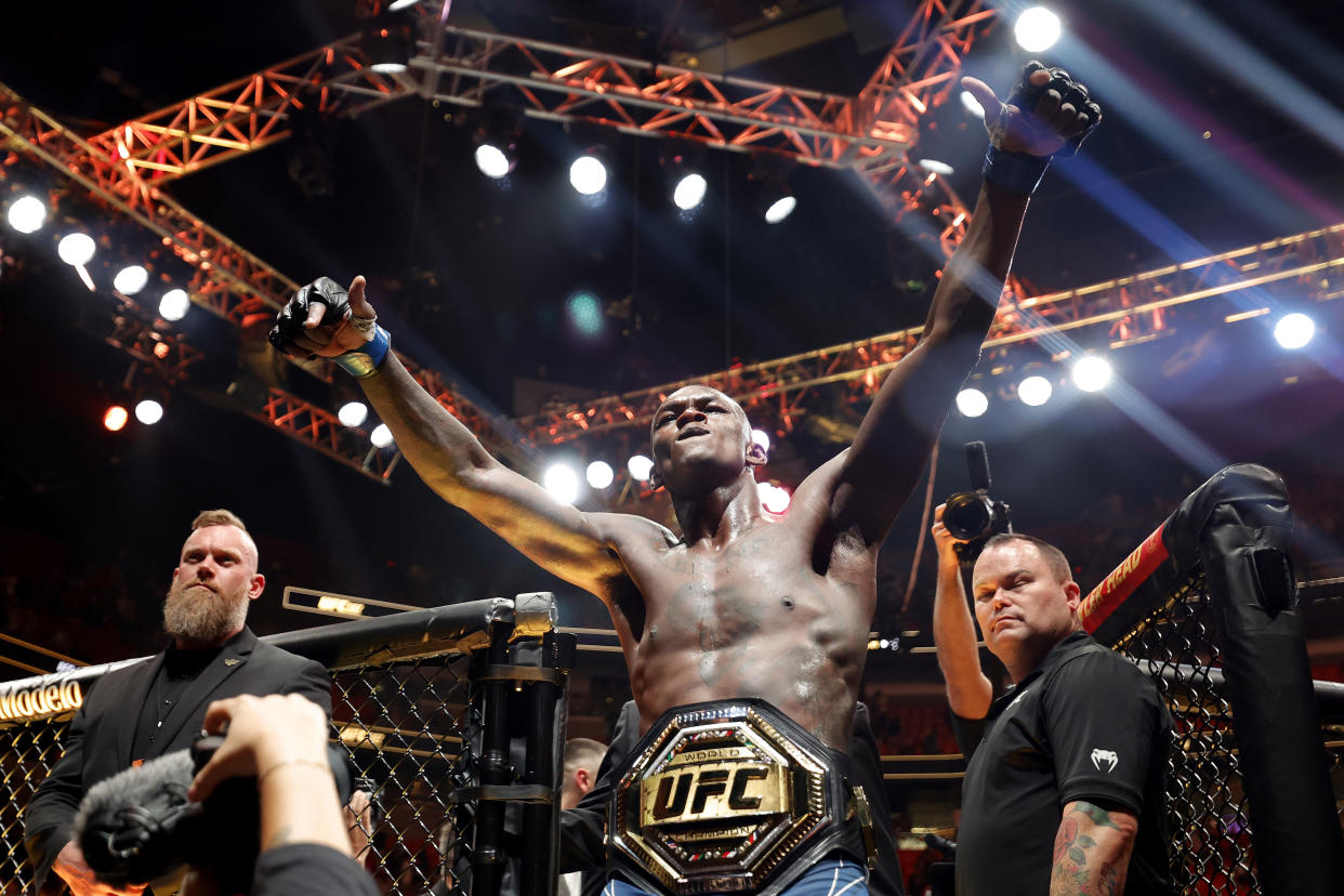 MIAMI, FLORIDA - APRIL 08: Israel Adesanya of Nigeria celebrates after knocking out Alex Pereira of Brazil in round 2 to reclaim the middleweight title during UFC 287 at Kaseya Center on April 08, 2023 in Miami, Florida. (Photo by Carmen Mandato/Getty Images)