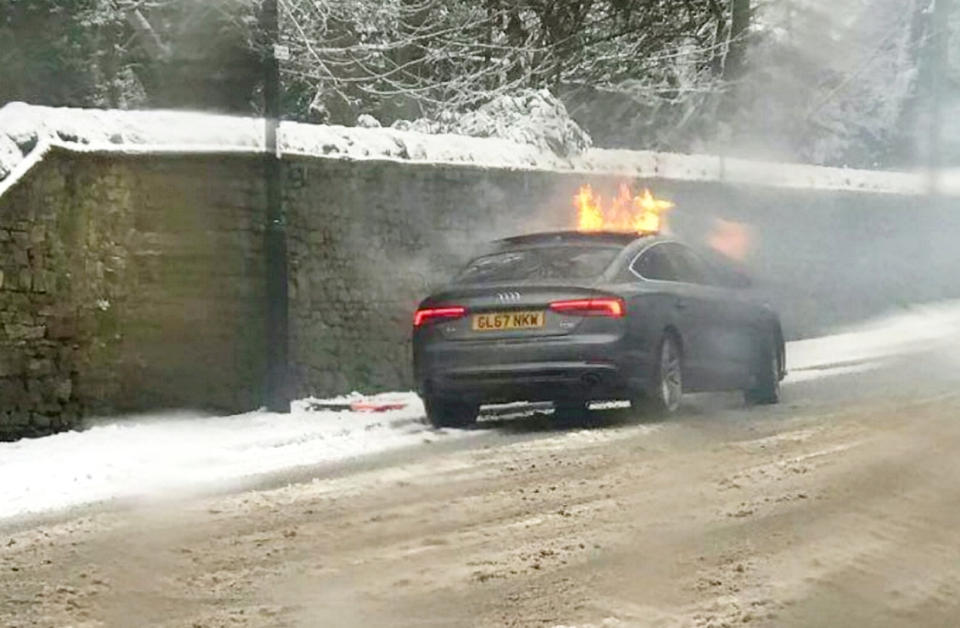 As he battled to put out the flames on his chest, Will watched in horror as the Audi A5 went up in flames (Picture: SWNS)