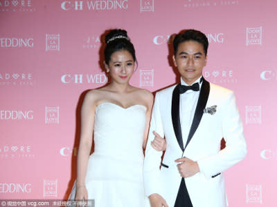 Beatrice Fang and husband hold all pink wedding