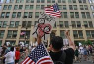 <p>Protestors march past offices of the US Immigration and Customs Enforcement (I.C.E.) during a demonstration against the US immigration policies separating migrant families in Chicago, June 30, 2018. (Photo: Jim Young/AFP/Getty Images) </p>