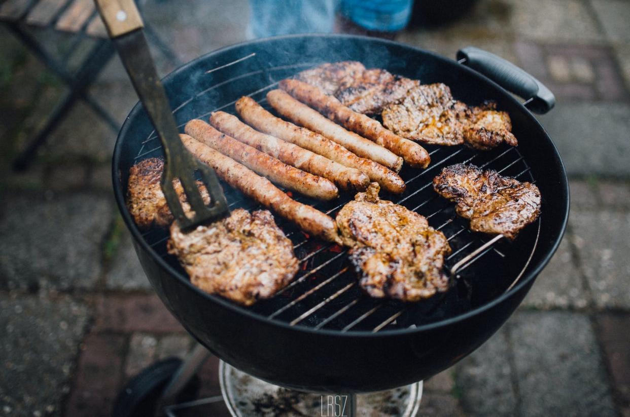 Cooking food over an open flame produces unique flavors thanks to some interesting chemistry. <a href="https://www.gettyimages.com/detail/photo/man-preparing-food-on-barbecue-grill-royalty-free-image/717232191?adppopup=true" rel="nofollow noopener" target="_blank" data-ylk="slk:Lars Szatmari / EyeEm via Getty Images;elm:context_link;itc:0;sec:content-canvas" class="link ">Lars Szatmari / EyeEm via Getty Images</a>