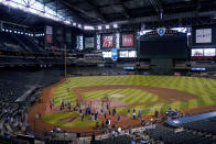 Draft prospects participate in the MLB baseball draft combine, Tuesday, June 20, 2023, in Phoenix. (AP Photo/Matt York)