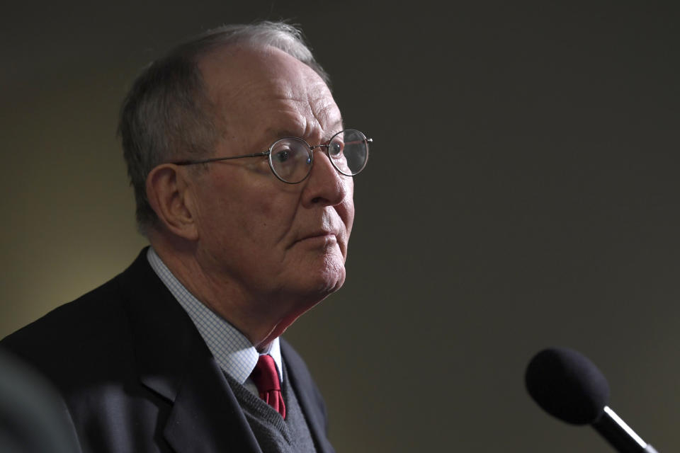 FILE - In this March 19, 2020, file photo Sen. Lamar Alexander, R-Tenn., talks with reporters following a Republican policy lunch on Capitol Hill in Washington. (AP Photo/Susan Walsh, File)