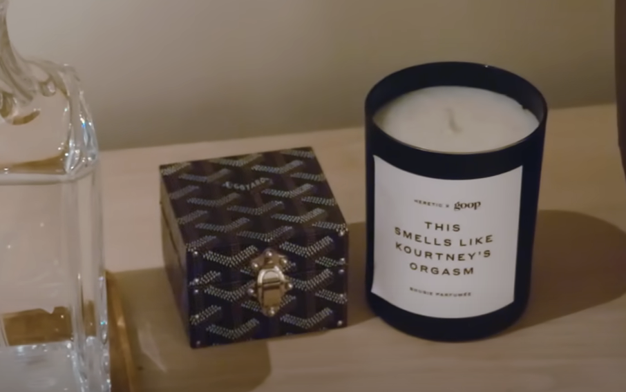 A candle that reads "this smells like Kourtney's orgasm"