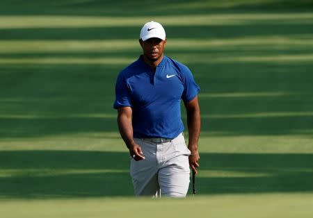 Aug 11, 2018; Saint Louis, MO, USA; Tiger Woods walks to the 18th green during the third round of the PGA Championship golf tournament at Bellerive Country Club. Mandatory Credit: Jerry Lai-USA TODAY Sports