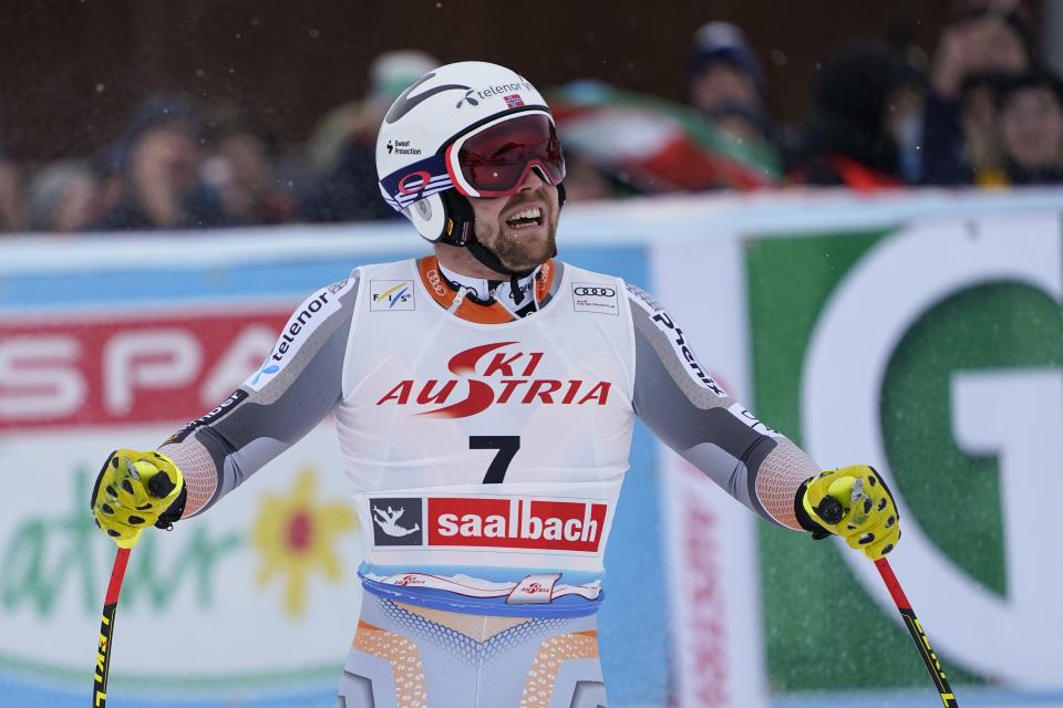 Norway's Aleksander Aamodt Kilde celebrates at the finish area of an alpine ski, men's World Cup Super G, in Saalbach-Hinterglemm, Austria, Friday, Feb. 14, 2020. (AP Photo/Giovanni Auletta)