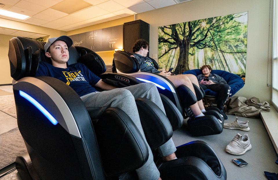 Ayden Dunst (left), music education major, Karl Weidler (center), business major, and Nate Laesch, music education major, enjoy the calm space of the SMART lab at Concordia University in Mequon in September.
