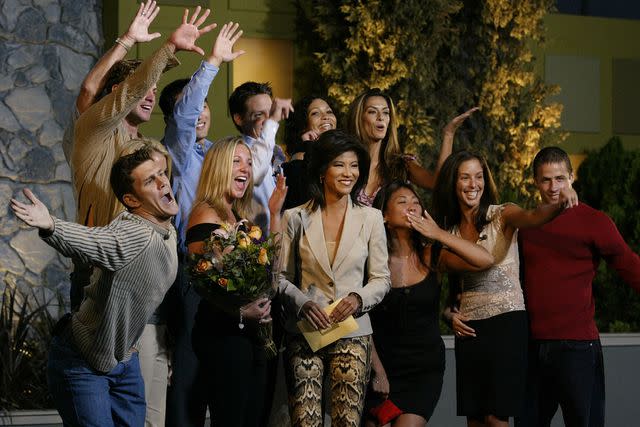 <p>Doug Benc/Getty </p> Julie Chen is surrounded by cast members after the season finale of Big Brother 4 on September 24, 2003 at the CBS Studio Center