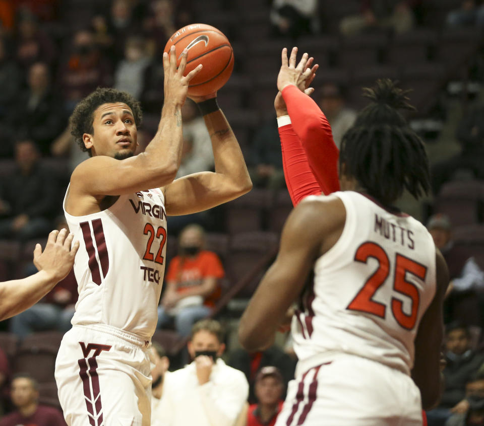 Virginia Tech's Keve Aluma (22) looks to shoot against Cornell during the first half of an NCAA college basketball game Wednesday, Dec. 8 2021, in Blacksburg, Va. (Matt Gentry/The Roanoke Times via AP)