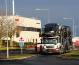 A lorry with car carrier trailer leaves the Honda car plant in Swindon, Britain, February 18, 2019. REUTERS/Eddie Keogh