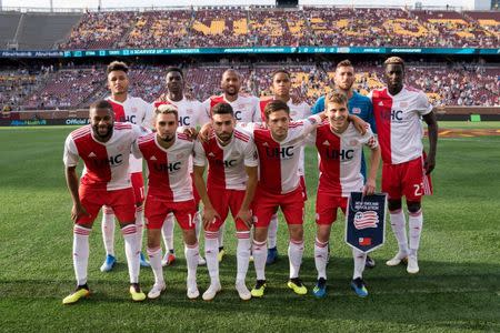 Jul 18, 2018; Minneapolis, MN, USA; New England Revolution starting lineup against Minnesota United at TCF Bank Stadium. Mandatory Credit: Brad Rempel-USA TODAY Sports