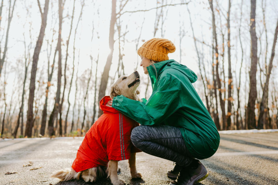 Photo of active young woman and her dog outdoors. Immune systems can also be supported through daily exercise. (Getty)