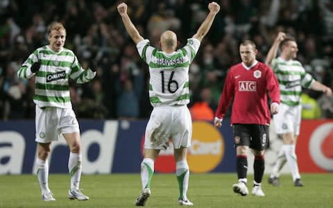 Celtic players celebrate victory against Manchester United - Credit: reuters