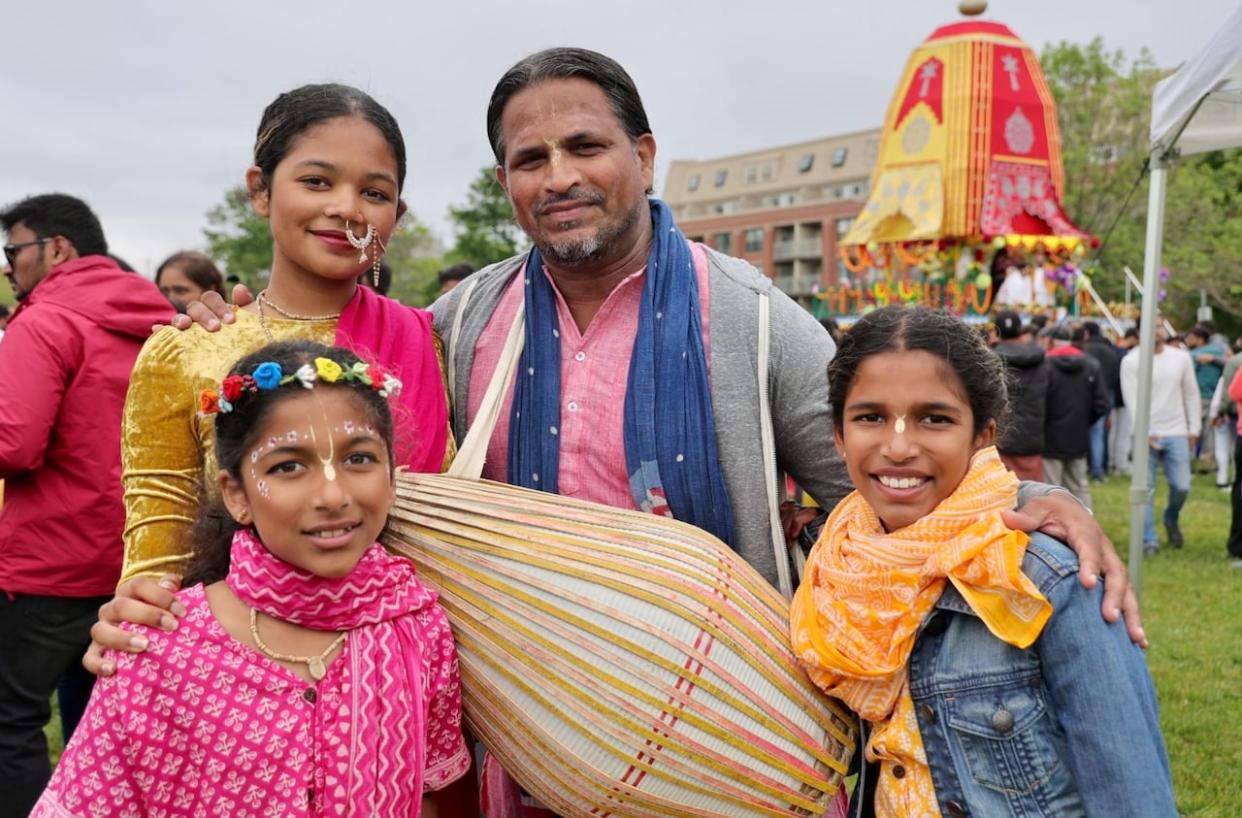 Shammy Sohal with his daughters Vaishali, Kishori and Krshangi at the Ratha Yatra festival in Halifax in 2023. Sohal says much of the growth of his community is because of immigrants. (Jeorge Sadi/CBC - image credit)