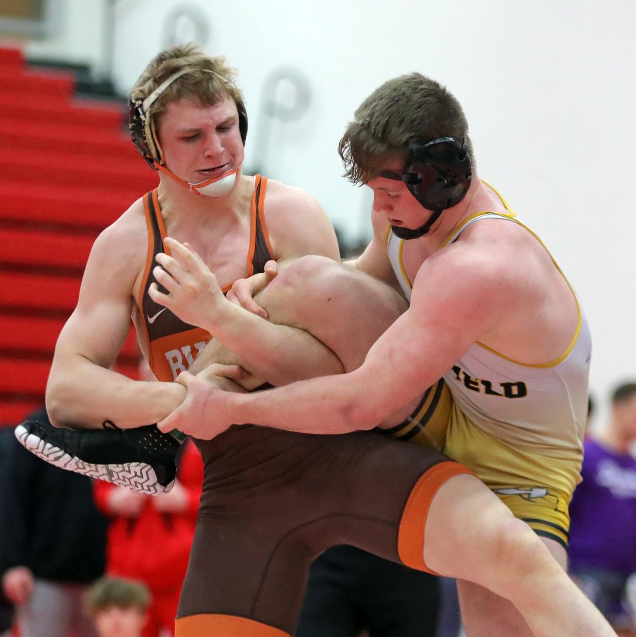 Buckeye's Eddie Neitenbach, left, looks to take down Garrettsville Garfield's Keegan Sell during the 190-pound final of the Wadsworth Grizzly Invitational Tournament on Jan. 20.