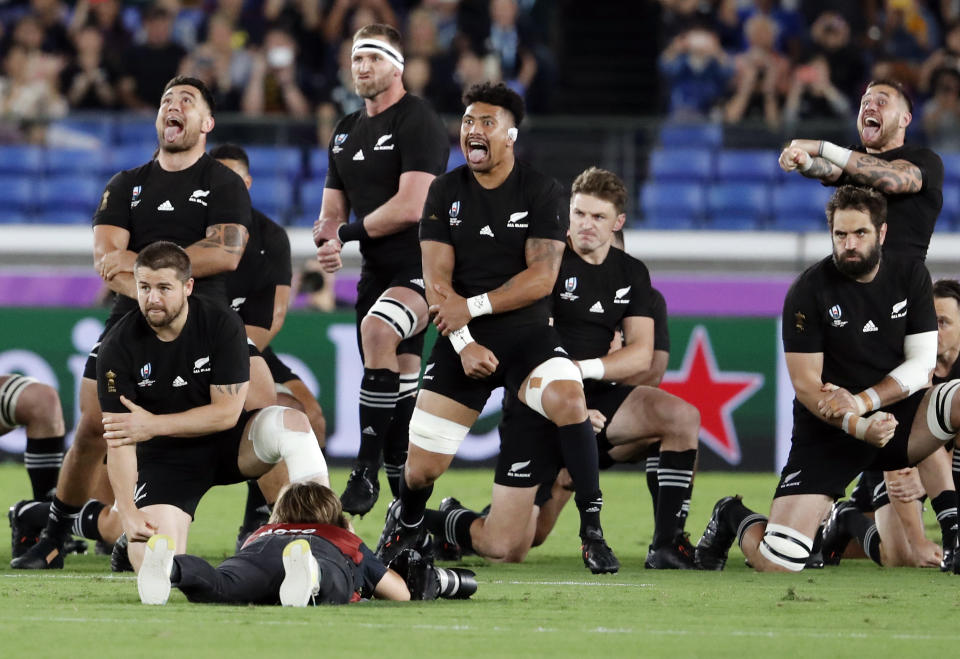 In this Saturday, Sept. 21, 2019, photo, New Zealand's All Blacks perform their haka ahead of the start of the Rugby World Cup Pool B game between New Zealand and South Africa in Yokohama, Japan. (AP Photo/Shuji Kajiyama, File)