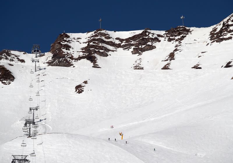 Cross country skiers climb on a slope in Les Crosets