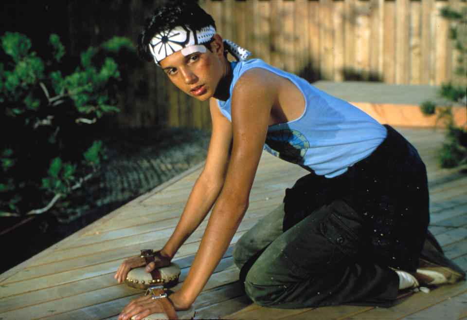 Ralph Macchio cleaning a deck in "The Karate Kid"