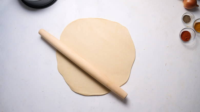 rolling dough with rolling pin